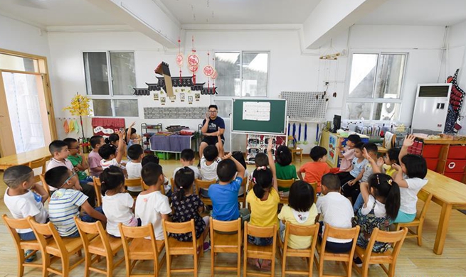 Teacher's Day: first and only male teacher at Xiaoxihu kindergarten in Nanjing