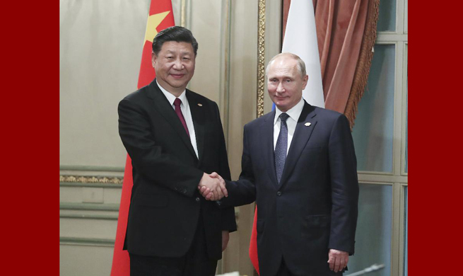 Xi, Putin meet on G20 sidelines