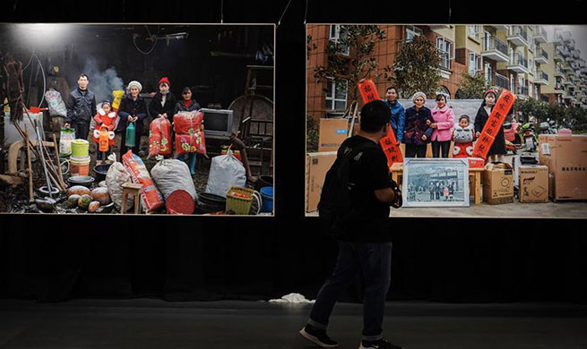 Photo exhibition themed poverty alleviation held in Beijing