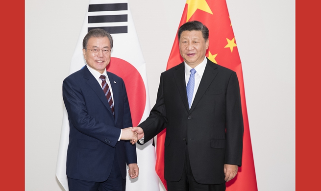 Xi, Moon agree to promote win-win cooperation, multilateralism and free trade