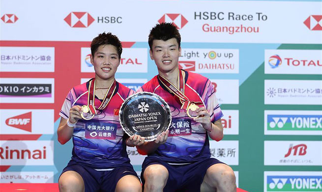 China wins mixed doubles at badminton's Japan Open