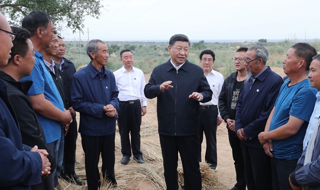 Xi highlights poverty relief, high-quality development, environmental protection