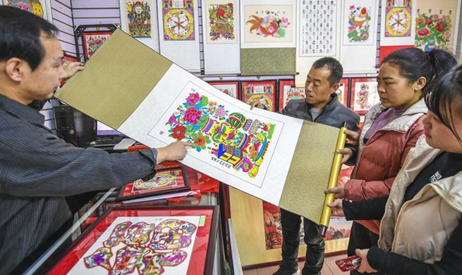 Sale of woodblock new year paintings enters peak season as Spring Festival nears