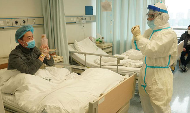 In pics: treatment of medical worker infected with COVID-19 in Wuhan