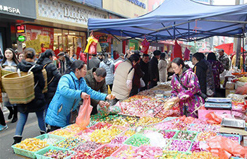 People buying goods in Guizhou for upcoming Spring Festival
