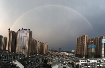 Rainbow appears after rainstorm over city proper of Nanning