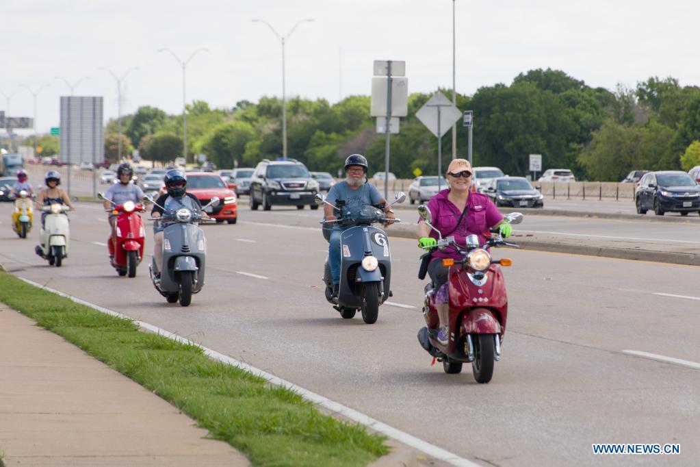Vespa parade held in Plano, U.S. Xinhua English.news.cn