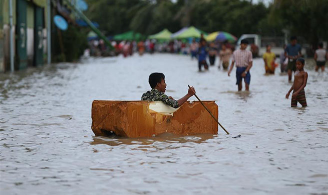 People affected by flooding in Yangon, Myanmar