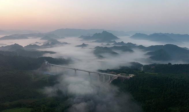 Xihuchong bridge of Qiangjiang-Zhangjiajie-Changde railway under construction in C China's Hunan