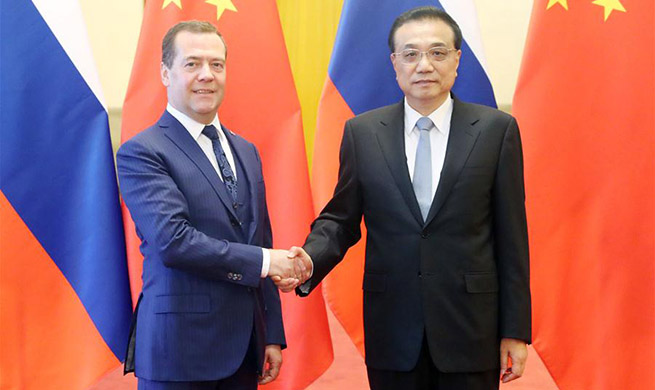 China, Russia eye enhanced mutual trust, economic ties