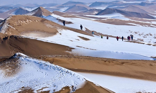 Snow scenery of Badain Jaran Desert in NW China's Gansu