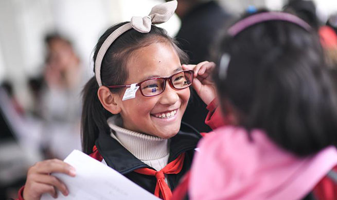 SW China county provides free glasses for students having eyesight problems