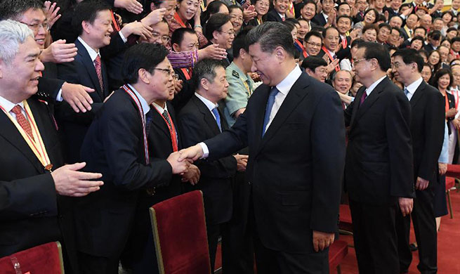 Xi meets representatives of outstanding units, individuals in education circles