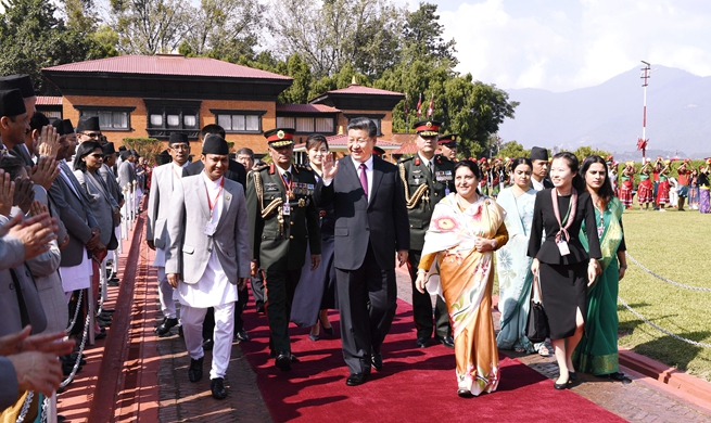 Xi returns to Beijing after informal meeting with Indian PM, visit to Nepal