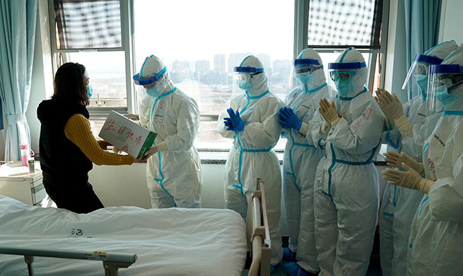 Coronavirus patient discharged from hospital after recovery in Wuhan