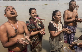 Hindu devotees take part in "Tarpan" rituals in Kolkata, India
