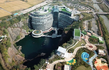 "Earth-scraper" hotel to open in Shanghai's unused quarry