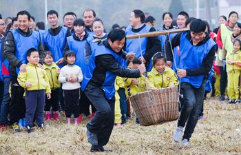 Rice field recreational activity held in E China's Zhejiang