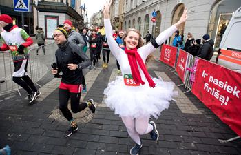 People attend annual Christmas Run in Vilnius, Lithuania