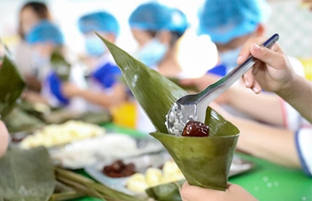 People make various kinds of Zongzi to celebrate upcoming Dragon Boat Festival