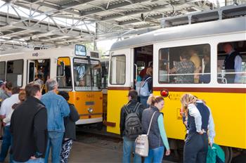 People visit 120-year-old Budafok Tram Depot in Budapest, Hungary