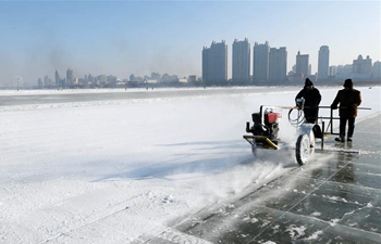Ice digging festival held in Harbin, China's Heilongjiang