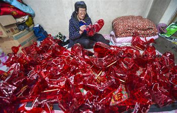 Villagers of Houyi Township make lnterns as Chinese New Year draws near