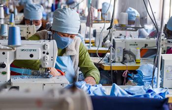 Workers across China make face masks to ensure supply