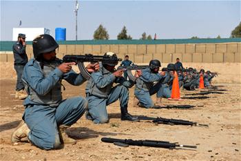 Afghan policemen take part in military training in Daman