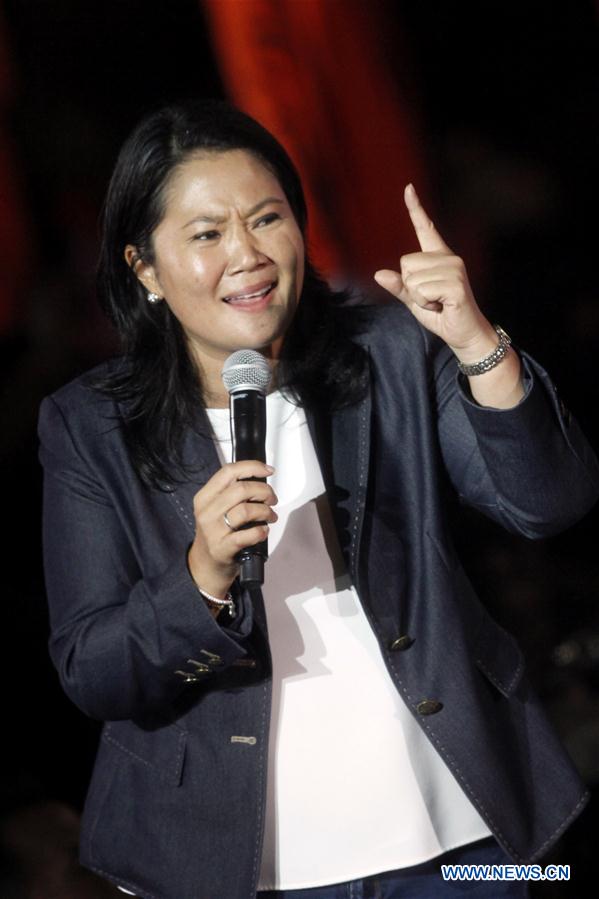 Peruvian presidential hopeful Keiko Fujimori of the center-right Popular Force (FP) Party addresses a campaign closing for the second round of elections in Peru, in the Villa El Salvador District, Lima province, Peru, on June 2, 2016.