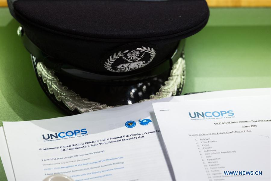 Police officers attend the United Nations Chiefs of Police Summit (UNCOPS), a historic gathering of more than 100 police leaders from around the world, at the UN headquarters in New York, June 3, 2016.