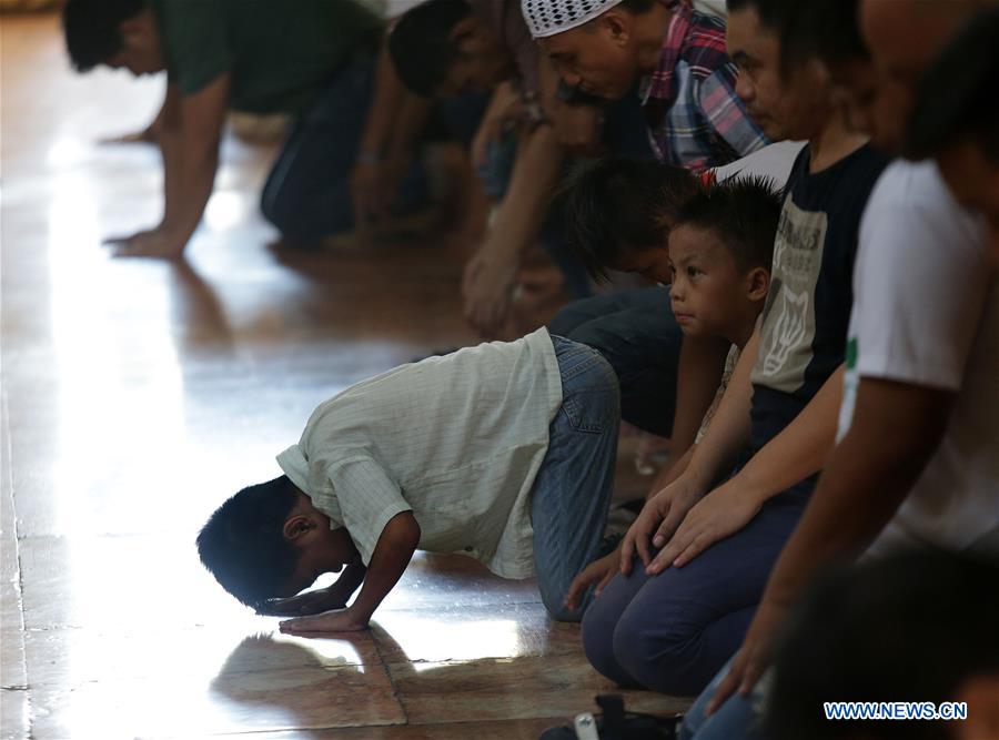 A Filipino Muslim prays on the first day of Ramadan at the Masjid al-Dahab mosque in Manila, the Philippines, June 6, 2016.
