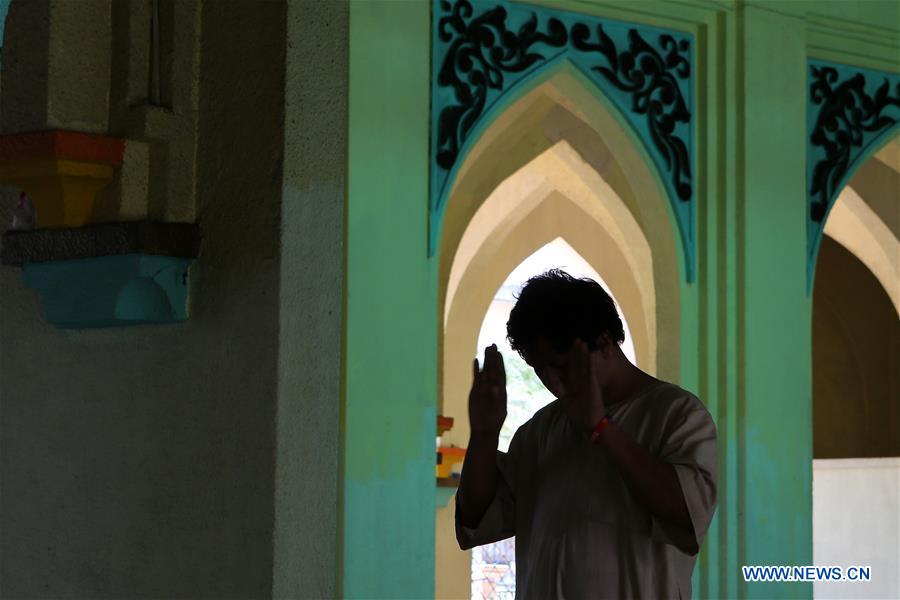 A Filipino Muslim prays on the first day of Ramadan at the Masjid al-Dahab mosque in Manila, the Philippines, June 6, 2016.