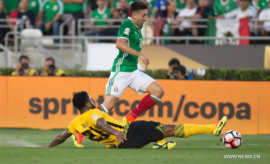 Mexico's Oribe Peralta (R) celebrates after scoring during the Copa America Centenario tournament Group C football match between Mexico and Jamaica in Pasadena, California, the United States, on June 9, 2016 Mexico's Oribe Peralta (R) celebrates after scoring during the Copa America Centenario tournament Group C football match between Mexico and Jamaica in Pasadena, California, the United States, on June 9, 2016