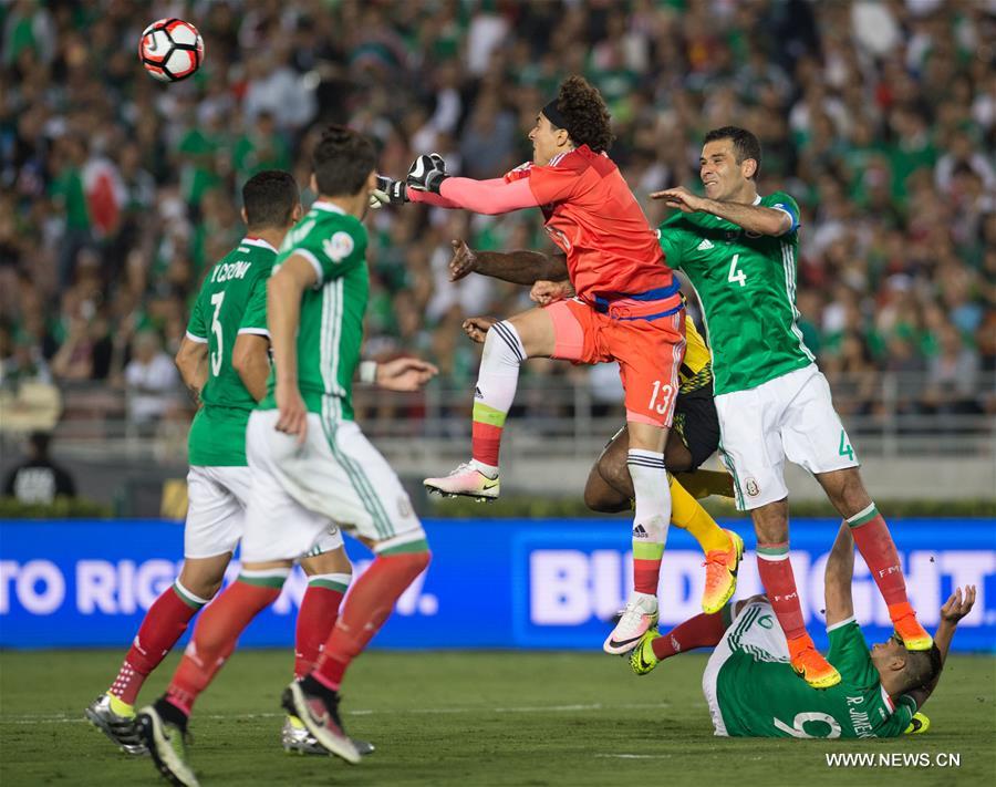 Mexico's Oribe Peralta (R) celebrates after scoring during the Copa America Centenario tournament Group C football match between Mexico and Jamaica in Pasadena, California, the United States, on June 9, 2016 Mexico's Oribe Peralta (R) celebrates after scoring during the Copa America Centenario tournament Group C football match between Mexico and Jamaica in Pasadena, California, the United States, on June 9, 2016
