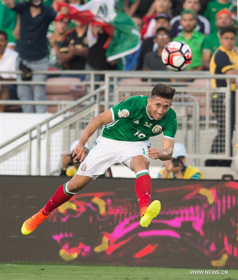 Mexico's Oribe Peralta (R) celebrates after scoring during the Copa America Centenario tournament Group C football match between Mexico and Jamaica in Pasadena, California, the United States, on June 9, 2016 Mexico's Oribe Peralta (R) celebrates after scoring during the Copa America Centenario tournament Group C football match between Mexico and Jamaica in Pasadena, California, the United States, on June 9, 2016