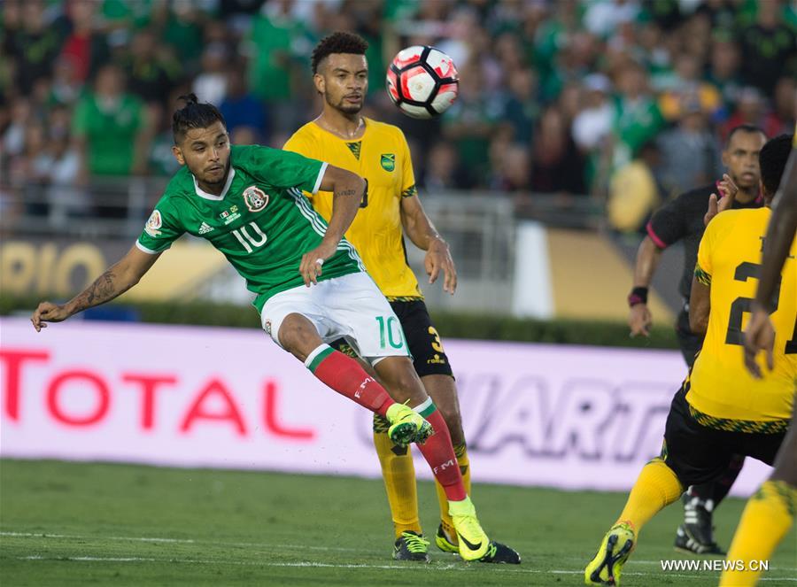 Mexico's Oribe Peralta (R) celebrates after scoring during the Copa America Centenario tournament Group C football match between Mexico and Jamaica in Pasadena, California, the United States, on June 9, 2016 Mexico's Oribe Peralta (R) celebrates after scoring during the Copa America Centenario tournament Group C football match between Mexico and Jamaica in Pasadena, California, the United States, on June 9, 2016