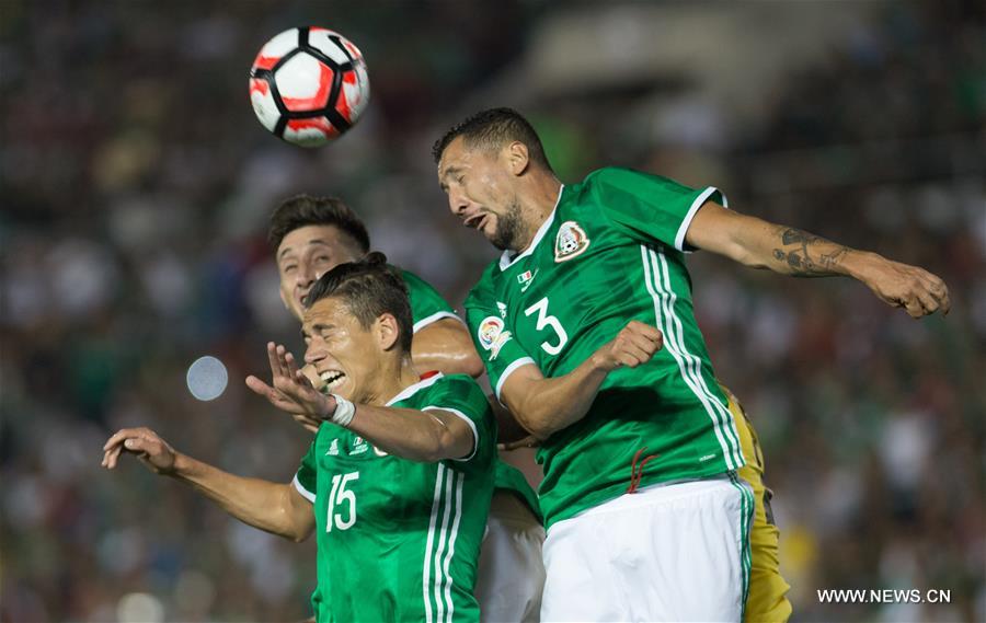 Mexico's Oribe Peralta (R) celebrates after scoring during the Copa America Centenario tournament Group C football match between Mexico and Jamaica in Pasadena, California, the United States, on June 9, 2016 Mexico's Oribe Peralta (R) celebrates after scoring during the Copa America Centenario tournament Group C football match between Mexico and Jamaica in Pasadena, California, the United States, on June 9, 2016