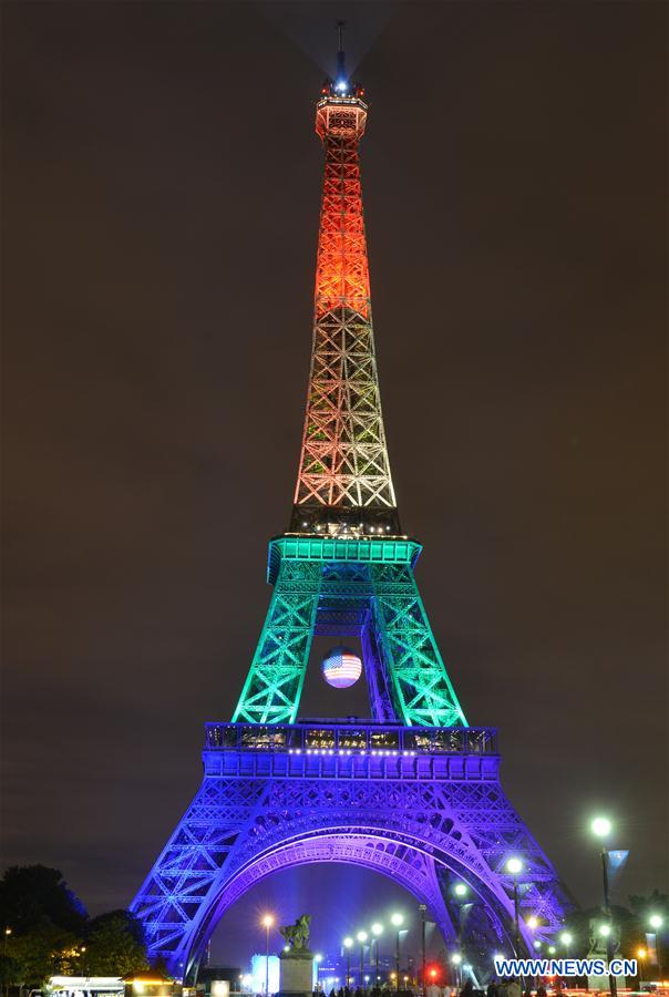 The Eiffel Tower is illuminated in the colors of the rainbow to pay tribute to Orlando nightclub shooting victims, in Paris, France, June 13, 2016. The Eiffel Tower is illuminated in the colors of the rainbow to pay tribute to Orlando nightclub shooting victims, in Paris, France, June 13, 2016.
