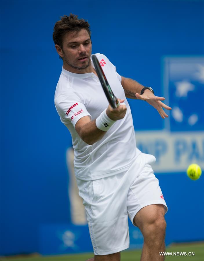 Stan Wawrinka of Switzerland returns a shot during his singles first round match against Fernando Verdasco of Spain during day two of the ATP-500 Aegon Championships at the Queen's Club in London, Britain on June 14, 2016 Stan Wawrinka of Switzerland returns a shot during his singles first round match against Fernando Verdasco of Spain during day two of the ATP-500 Aegon Championships at the Queen's Club in London, Britain on June 14, 2016