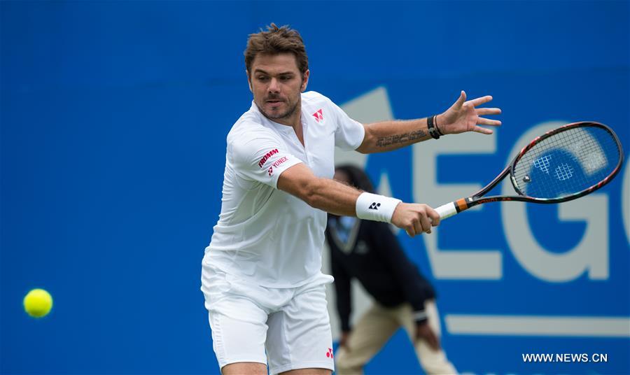 Stan Wawrinka of Switzerland returns a shot during his singles first round match against Fernando Verdasco of Spain during day two of the ATP-500 Aegon Championships at the Queen's Club in London, Britain on June 14, 2016 Stan Wawrinka of Switzerland returns a shot during his singles first round match against Fernando Verdasco of Spain during day two of the ATP-500 Aegon Championships at the Queen's Club in London, Britain on June 14, 2016