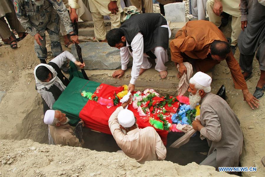 Relatives attend the funeral of a border policeman in Jalalabad, capital of eastern Nangarhar province, Afghanistan, on June 15, 2016. Relatives attend the funeral of a border policeman in Jalalabad, capital of eastern Nangarhar province, Afghanistan, on June 15, 2016.