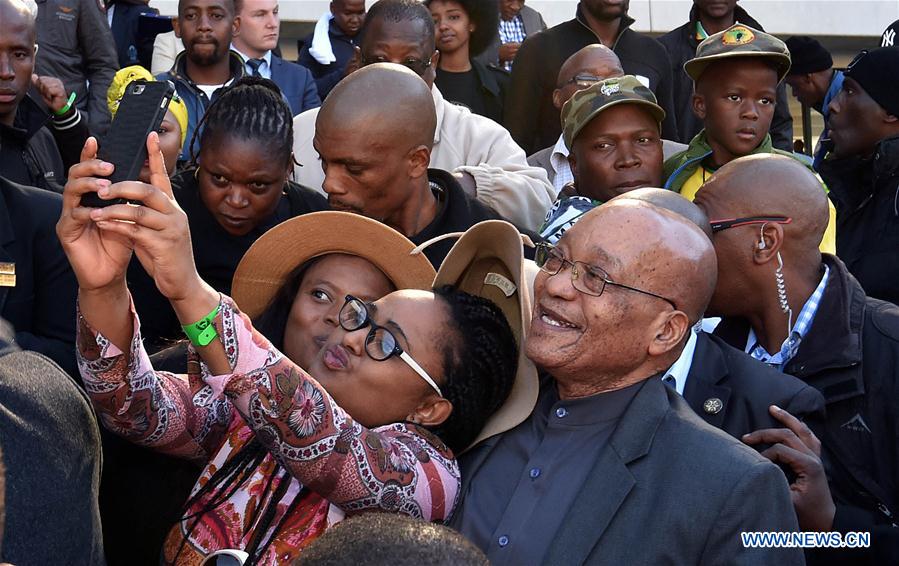 A girl takes selfie with South African President Jacob Zuma during the commemoration of the Youth Day in Soweto, south of Johannesburg, South Africa, on June 16, 2016. A girl takes selfie with South African President Jacob Zuma during the commemoration of the Youth Day in Soweto, south of Johannesburg, South Africa, on June 16, 2016.