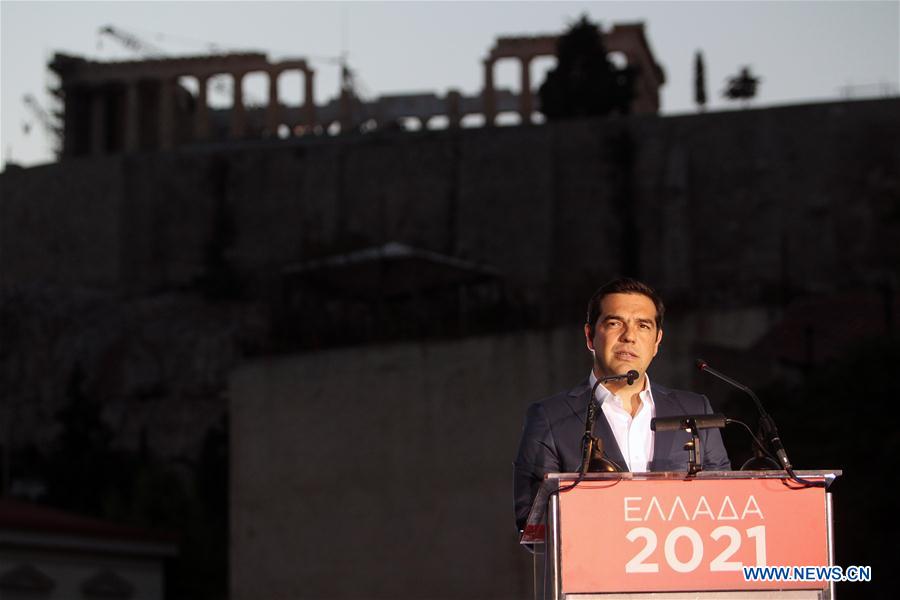 Greek Prime Minister Alexis Tsipras delivers a speech at the Acropolis museum with the ancient Parthenon temple seen in the background in Athens, Greece, June 16, 2016. Greek Prime Minister Alexis Tsipras delivers a speech at the Acropolis museum with the ancient Parthenon temple seen in the background in Athens, Greece, June 16, 2016.