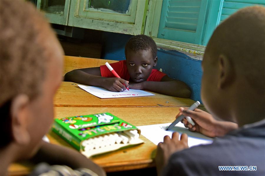 Children have a class at African Hope Learning Center in Cairo, Egypt on June 20, 2016.