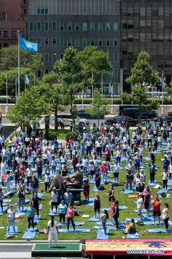 People attend the celebration of the 2016 International Day of Yoga at the United Nations headquarters in New York, June 21, 2016. People attend the celebration of the 2016 International Day of Yoga at the United Nations headquarters in New York, June 21, 2016.