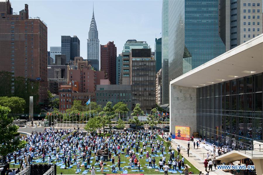 People attend the celebration of the 2016 International Day of Yoga at the United Nations headquarters in New York, June 21, 2016. People attend the celebration of the 2016 International Day of Yoga at the United Nations headquarters in New York, June 21, 2016.