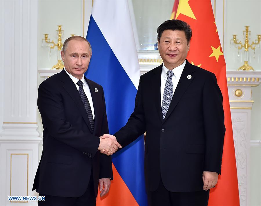 UZBEKISTAN-XI JINPING-VLADIMIR PUTIN-MEETING