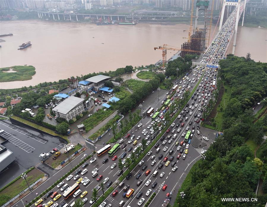 Local meteorological bureau has issued an orange alarm for rainstorm. 