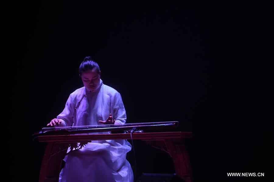 Musicians Wu Na and Huan Qing held the concert here on Saturday to show the charm of the traditional Chinese music with traditional musical instruments.